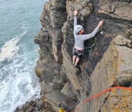 Climber learning to lead climb Learn to lead trad climbs
